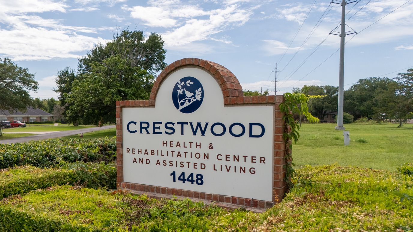 Exterior sign of Crestwood Assisted Living facility