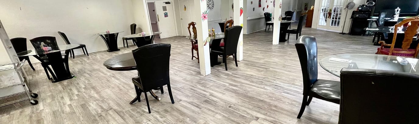 Dining area with tables and chairs set up