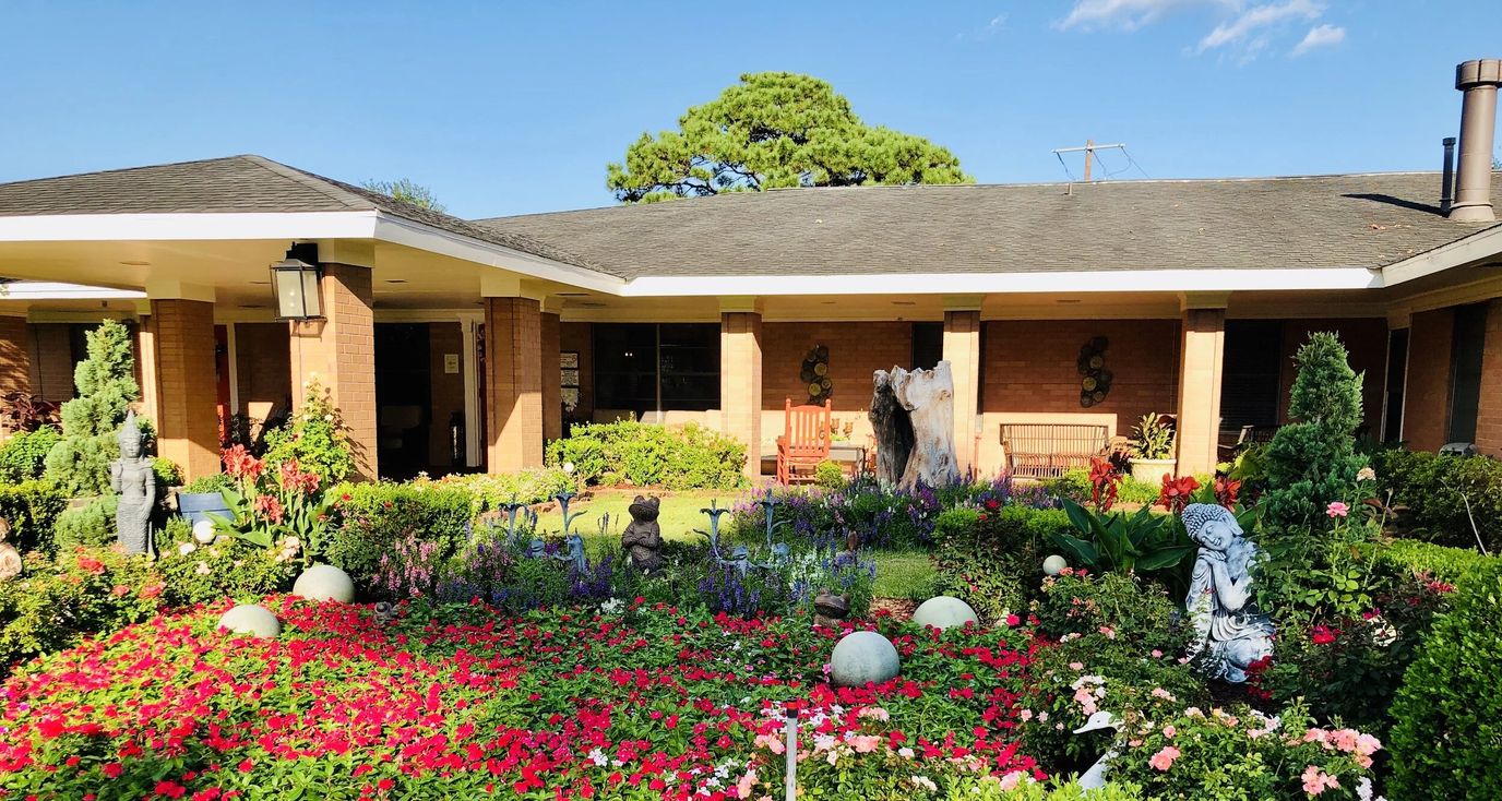 Colorful flower garden in front of the facility