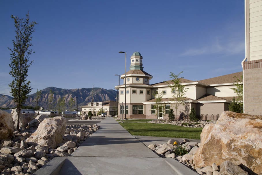St. Anne’s Center dba Lantern House (RS), nursing home in Ogden, UT — Pathway leading to a senior living facility with mountains