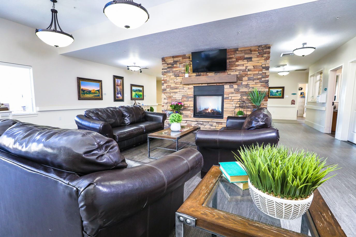Cozy common area with seating and a fireplace