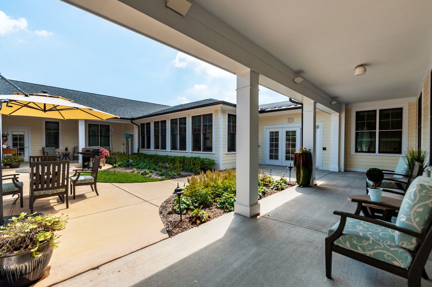Outdoor space with seating and garden area