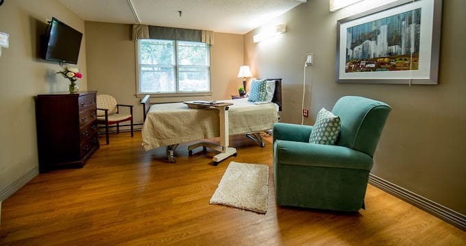 A well-furnished private resident room in the facility