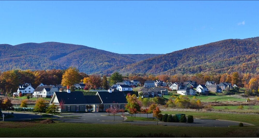 Exterior view of The Lodge at Old Trail surrounded by mountains