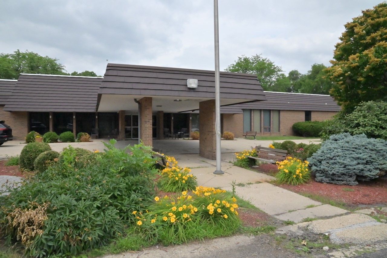 Exterior view of Goldwater Care facility with landscaping