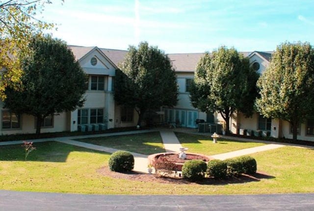 Exterior view of Poplar Estates with landscaped area