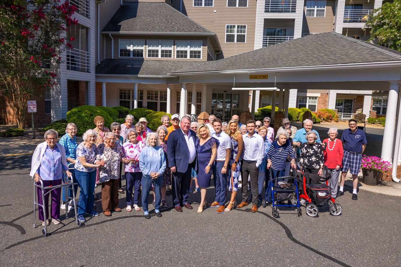 Residents and staff gathered outside the facility