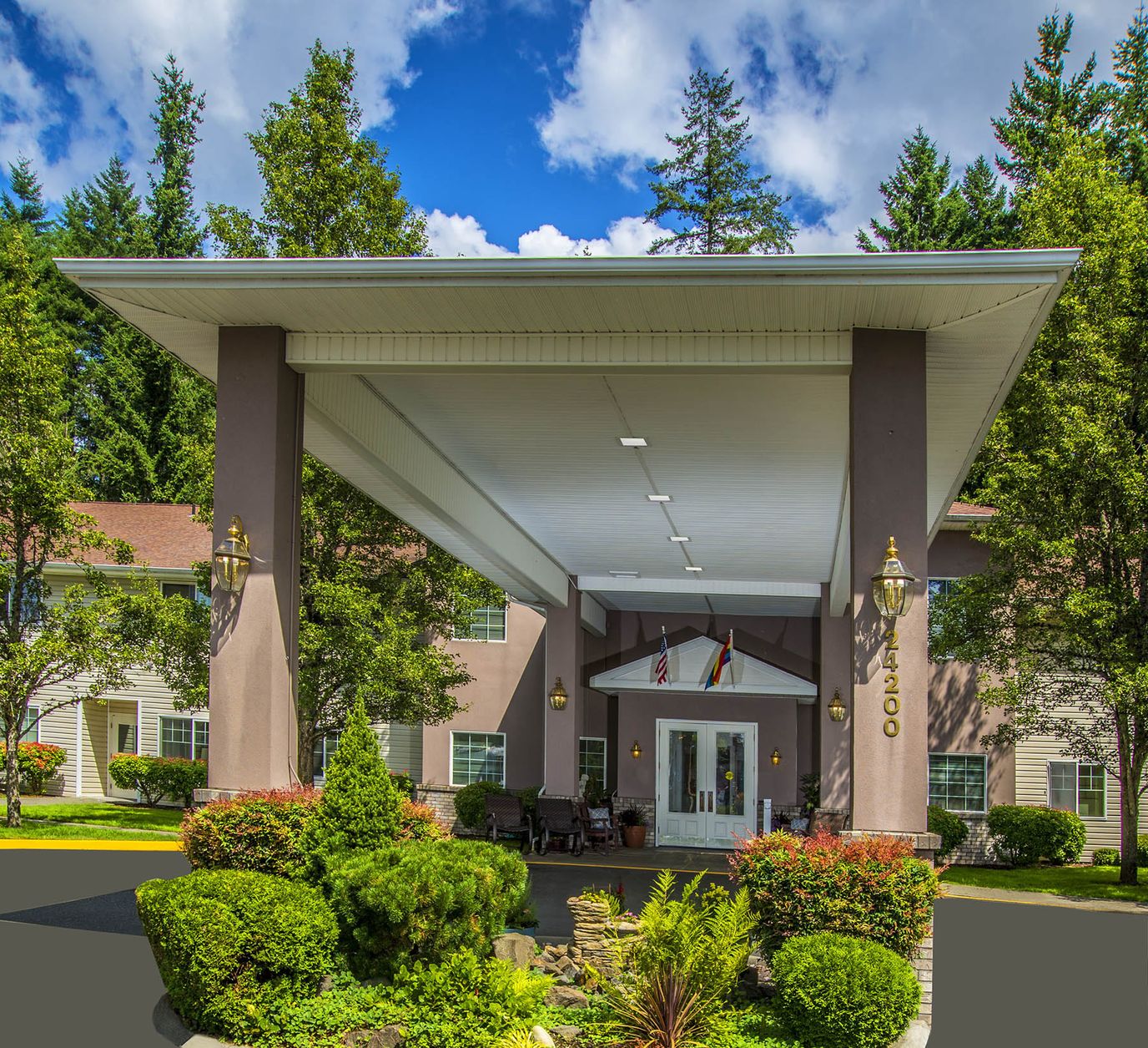 Exterior view of Fountain Court Assisted Living facility entrance