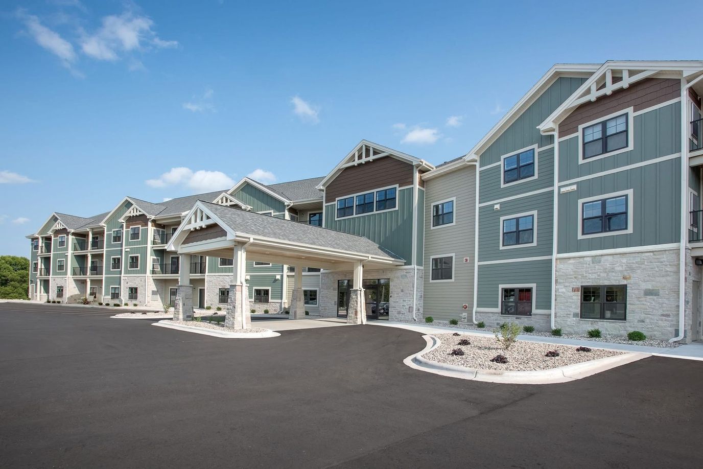 Country Villa Assisted Living, assisted living in Omro, WI — Modern assisted living facility with landscaped entrance and parking