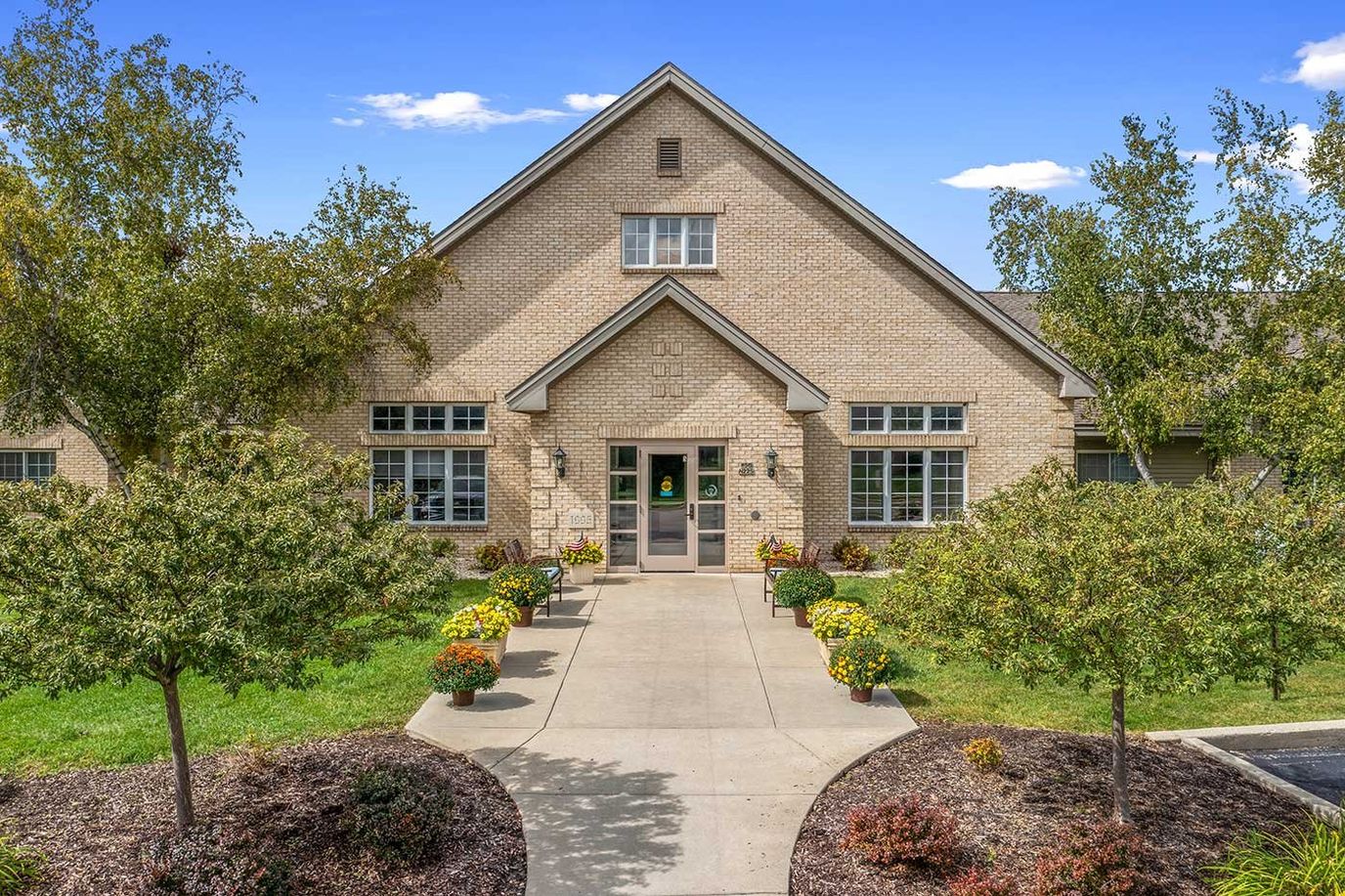 Exterior view of LakeHouse Cedarburg with landscaped pathway