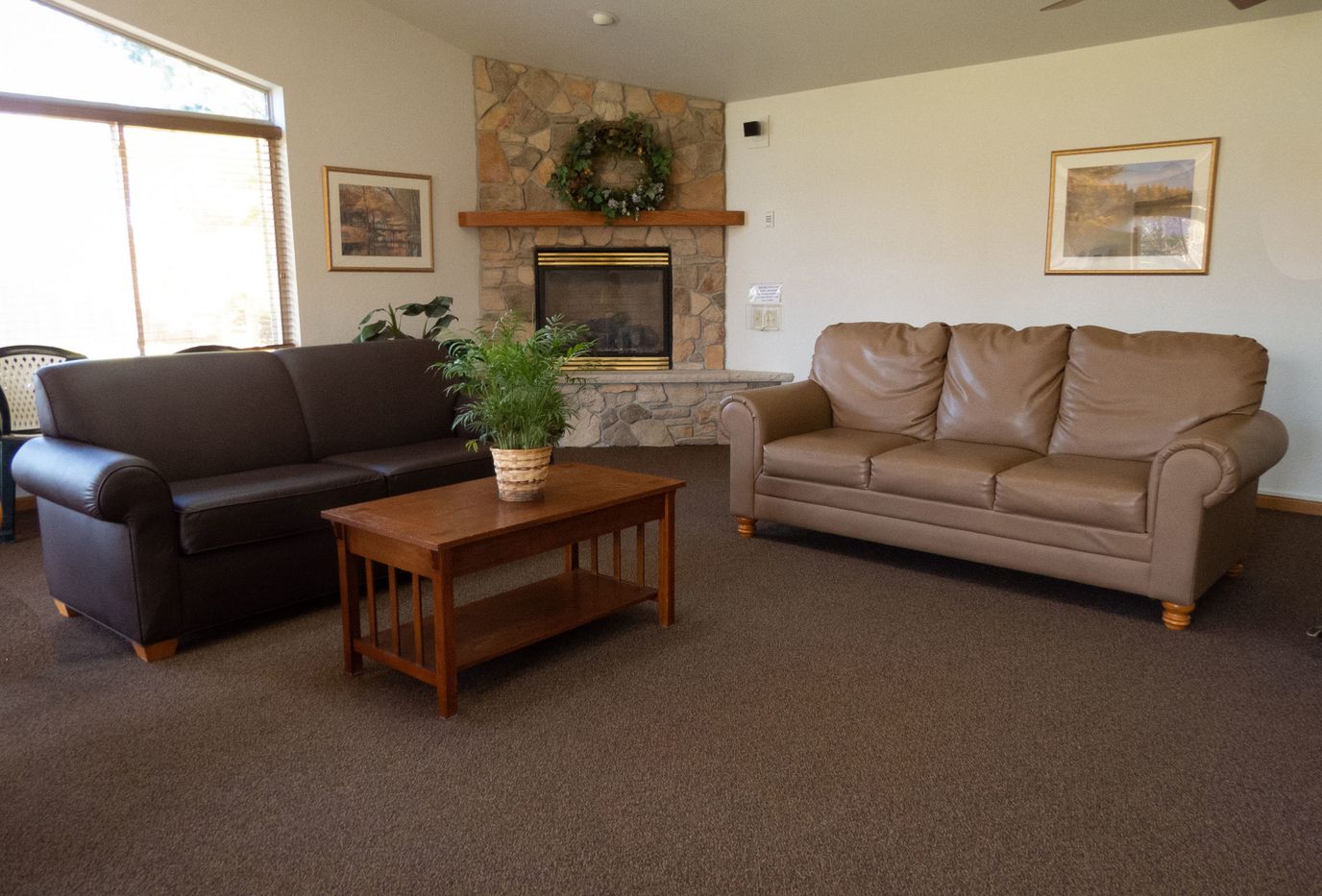 Interior common area with seating and fireplace