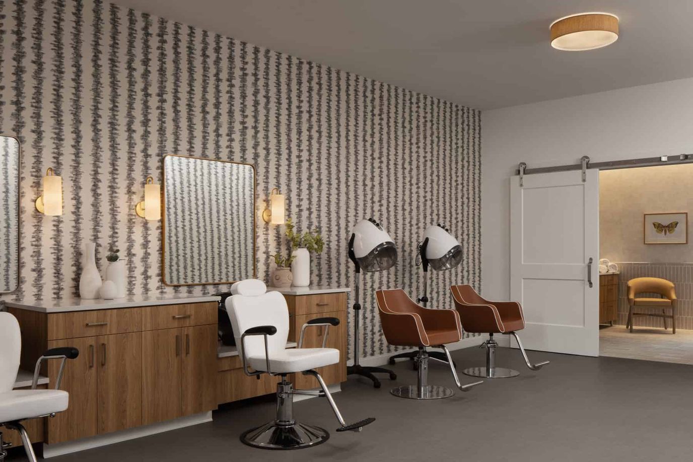 Lumia of Mequon Memory Care, assisted living in Mequon, WI — Hair salon area with styling chairs and mirrors