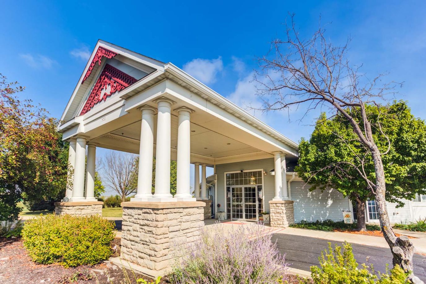 Exterior view of Dimensions Living Stevens Point building entrance