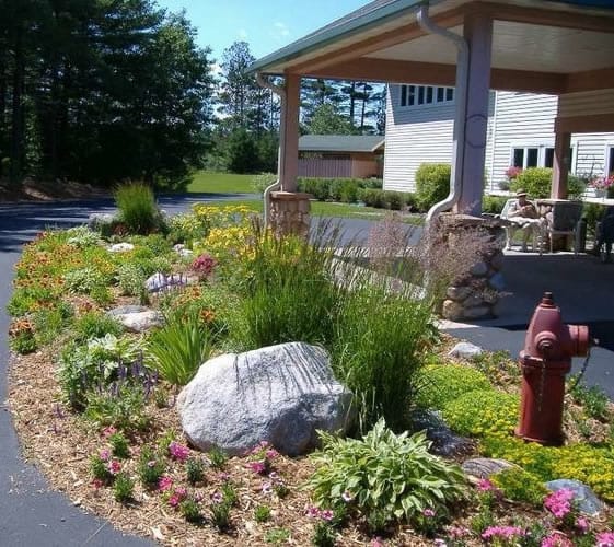 Beautifully landscaped outdoor space with flowers and greenery