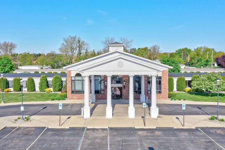 Front entrance of Carriage House Nursing and Rehab building