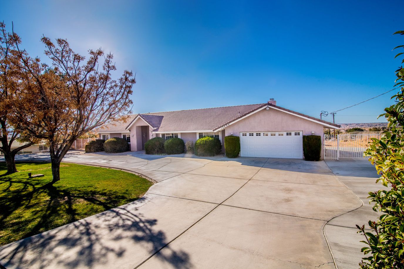 Exterior view of Apple Garden Seniors facility with landscaping
