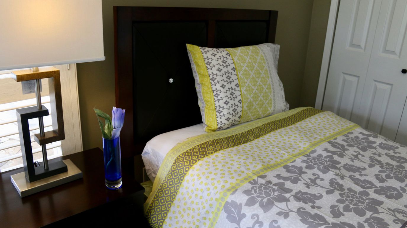 Cozy resident room with a neatly made bed