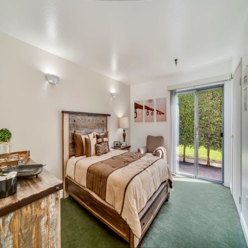 A cozy, well-decorated private resident room.