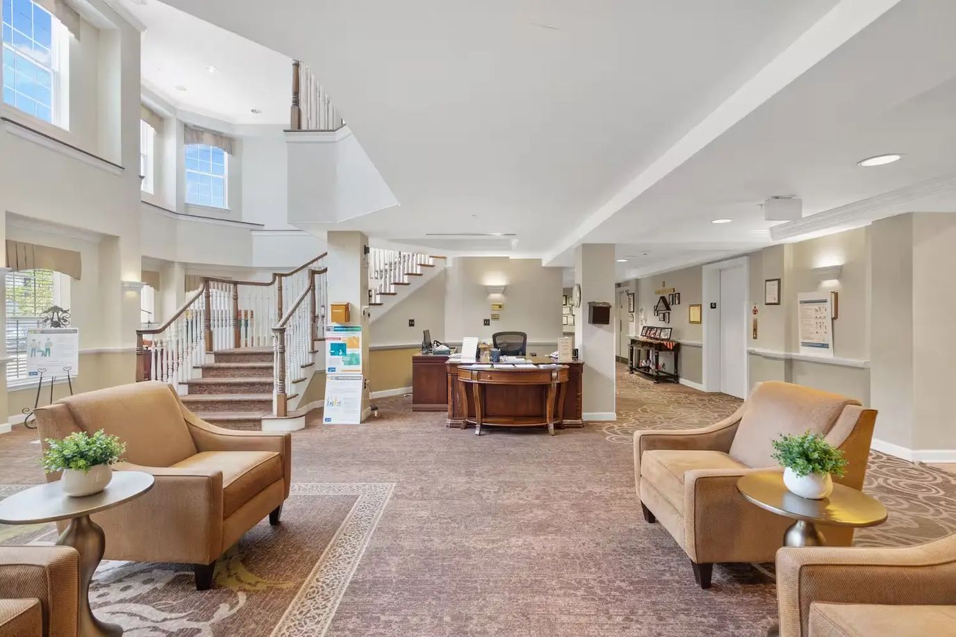 Welcoming lobby area with seating and reception desk.
