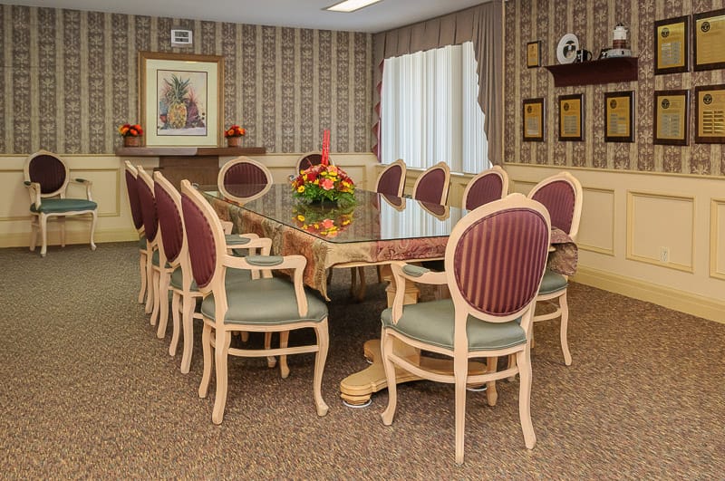 Conference room with a large table and seating