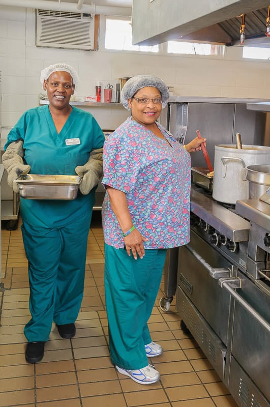 Staff preparing food in the kitchen