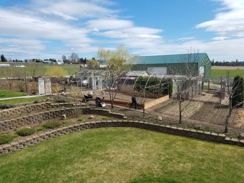 Garden area with staff working in the background