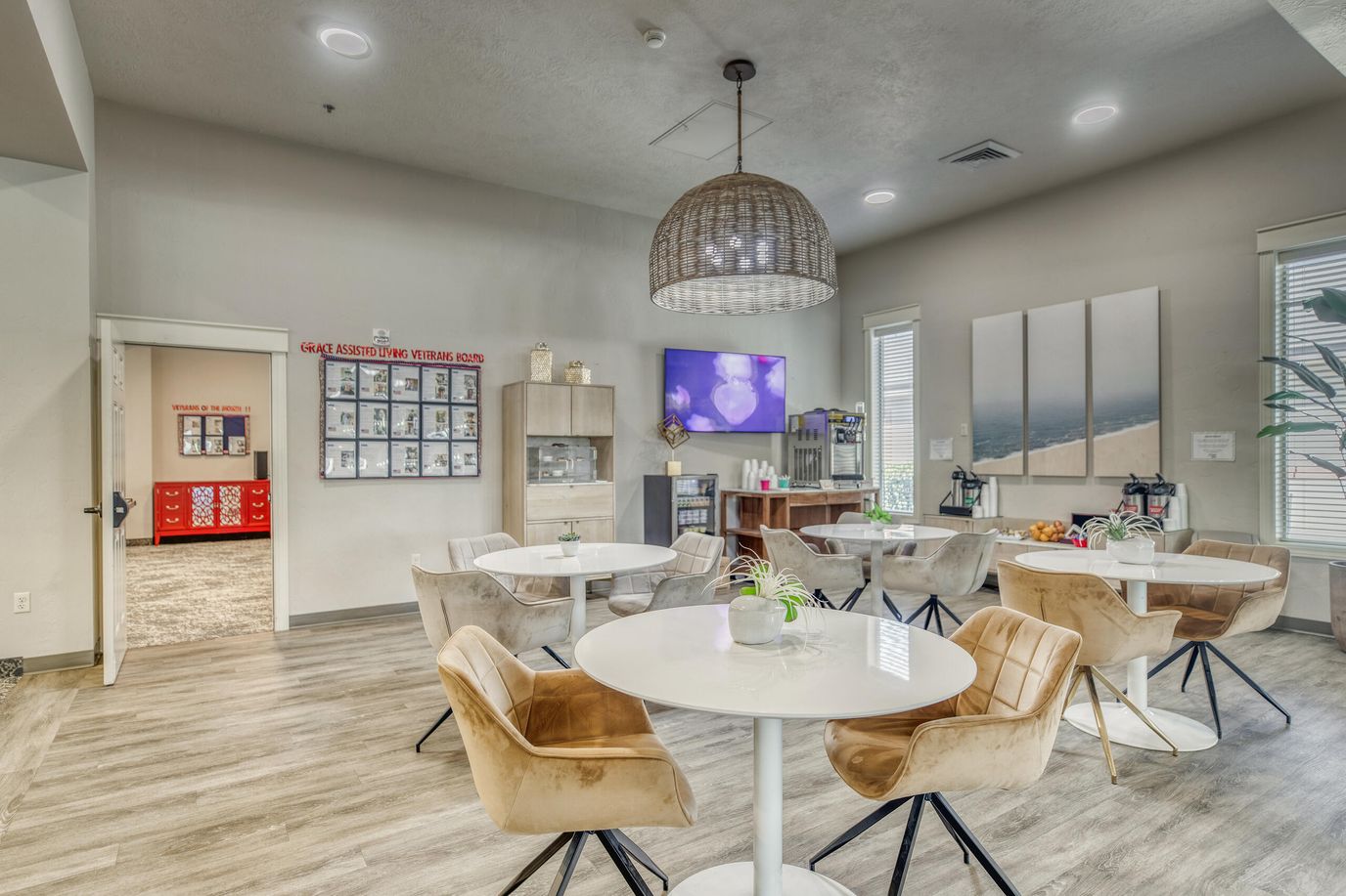 Bright common area with tables and chairs
