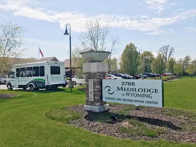 Exterior view of Medilodge of Wyoming with shuttle bus