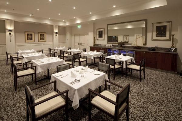 Elegant dining room with table settings and decor