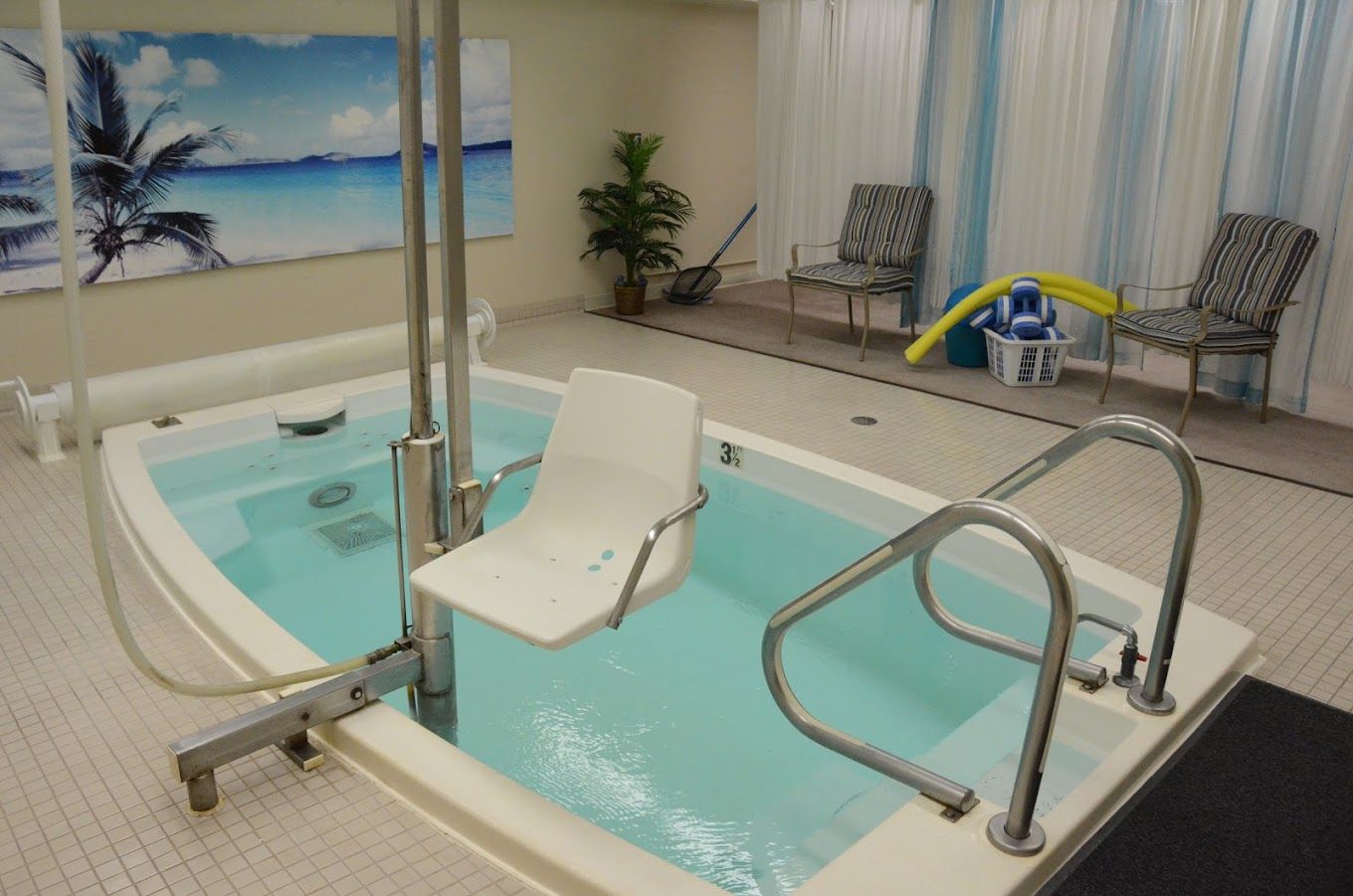 Accessible indoor therapy pool with a lift chair