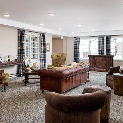 Bright common area with elegant seating and decor