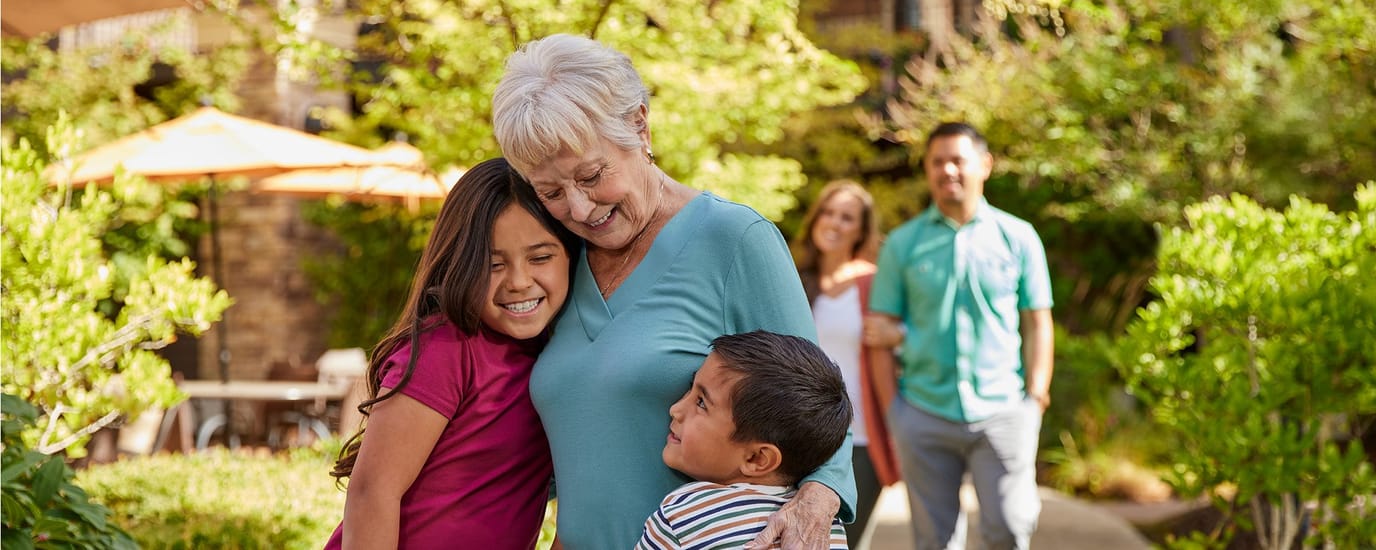 Grandmother enjoying time outdoors with children