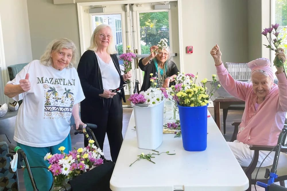 Residents engaged in flower arranging activity