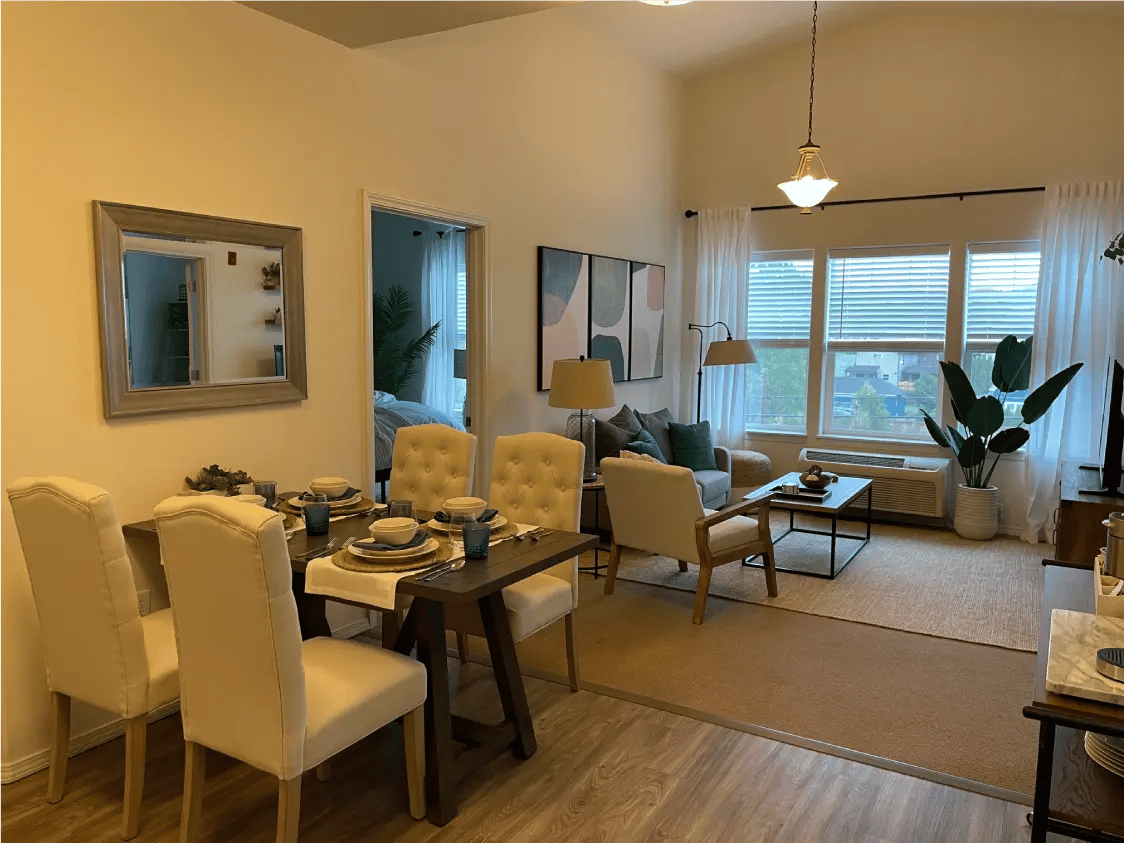 Interior view of a stylish living space with dining setup
