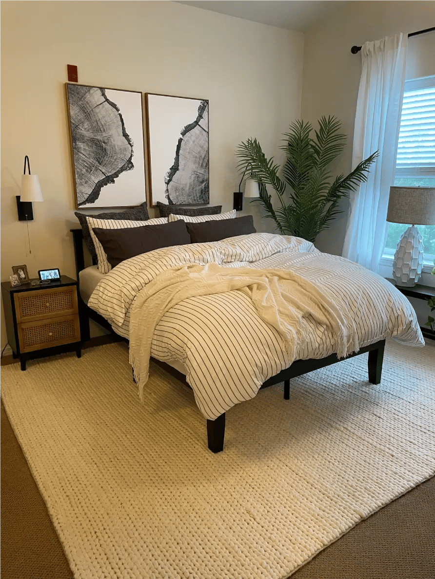Cozy resident bedroom with a bed and plants