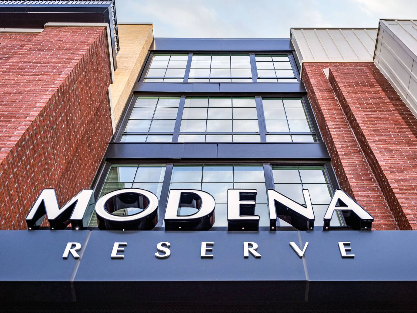 Facility logo displayed on the building exterior