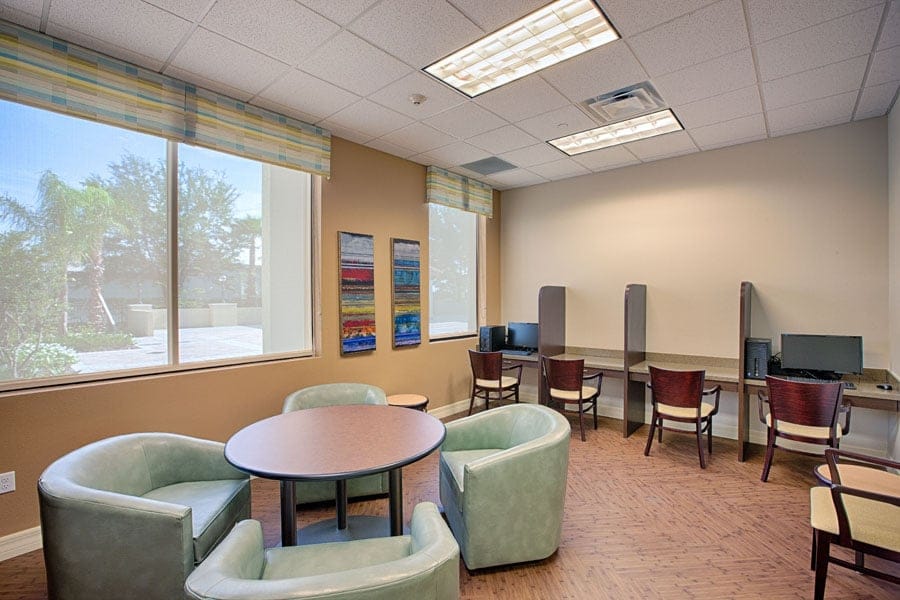 Seating area with computers and natural light