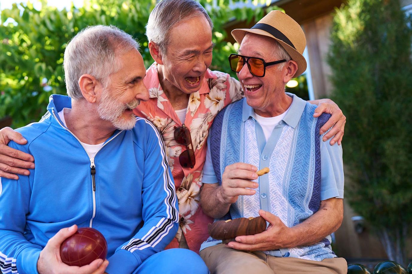 Three residents enjoying outdoor games together