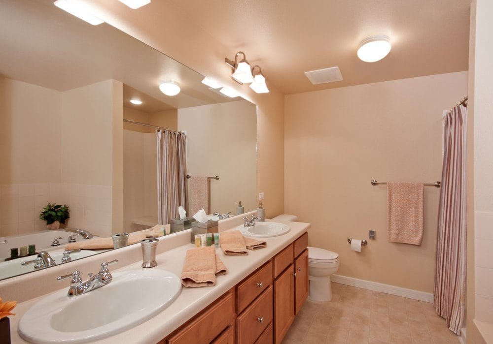 Bright and clean bathroom with double sinks