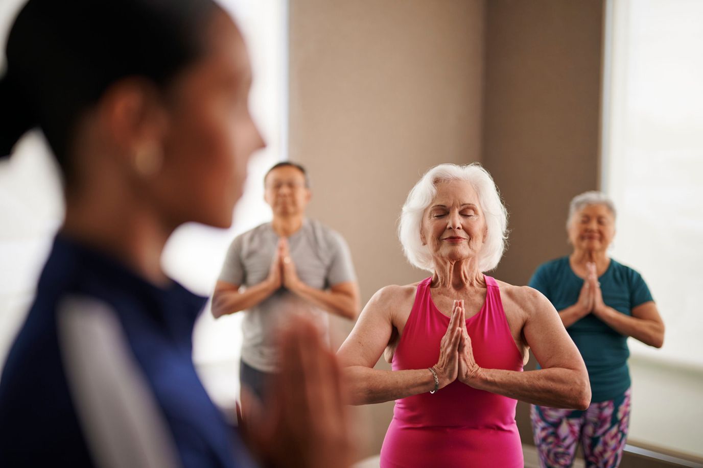 Residents participating in a yoga class