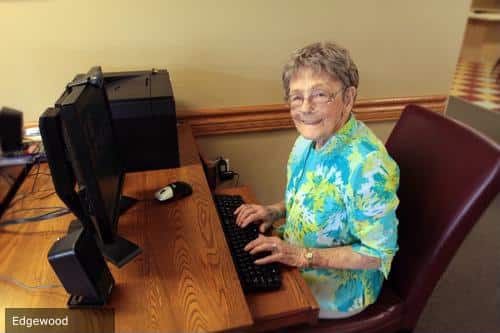 Resident using a computer in a common area