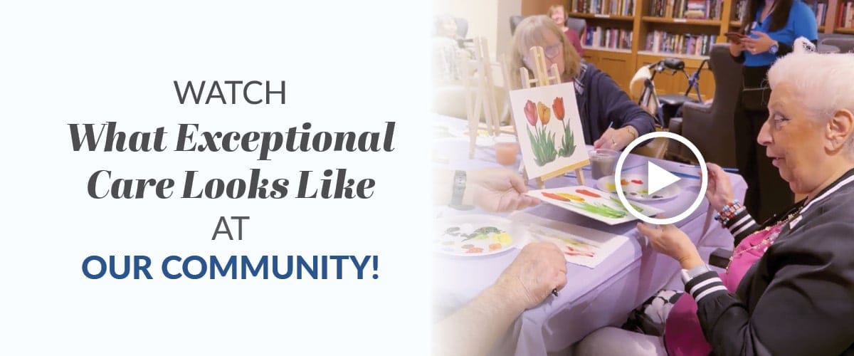 Residents participating in an art activity in a common area