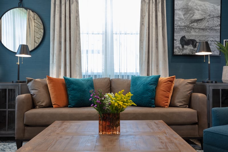 Comfortable lounge area with a sofa and decorative pillows