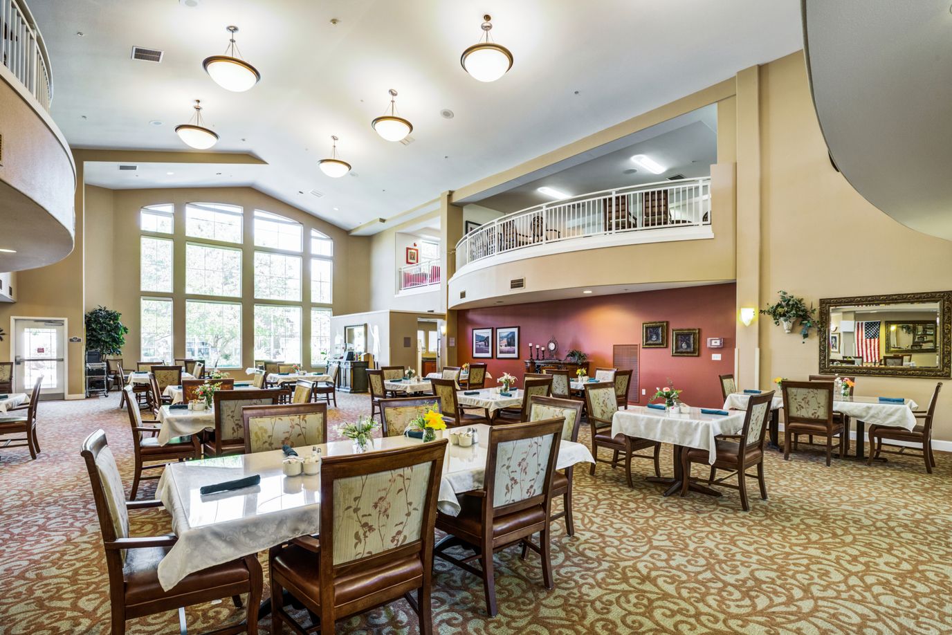 Bright dining area with tables and chairs