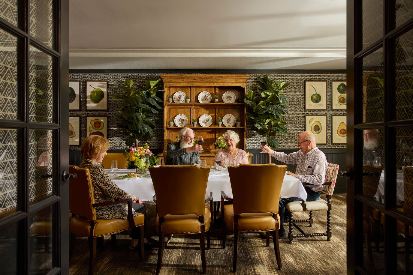 Residents enjoying a meal in the dining room