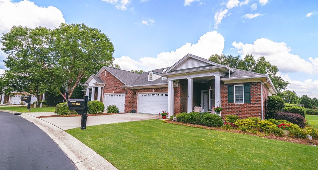 Exterior view of a residential building with landscaping