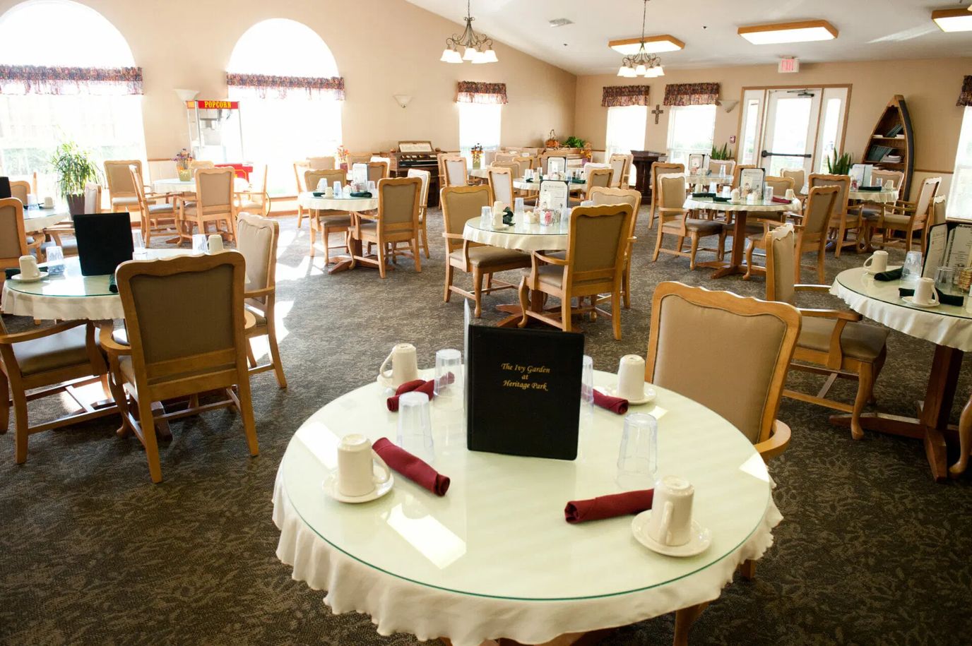 Well-set dining tables in the Heritage Park dining room