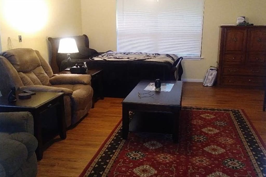 Comfortable living room with recliners and a coffee table