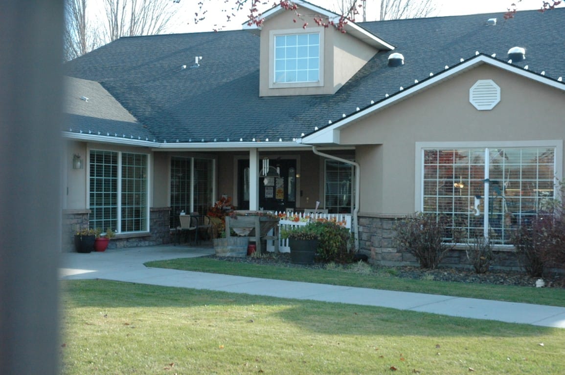 Front view of The Cottages at Meridian with landscaped gardens