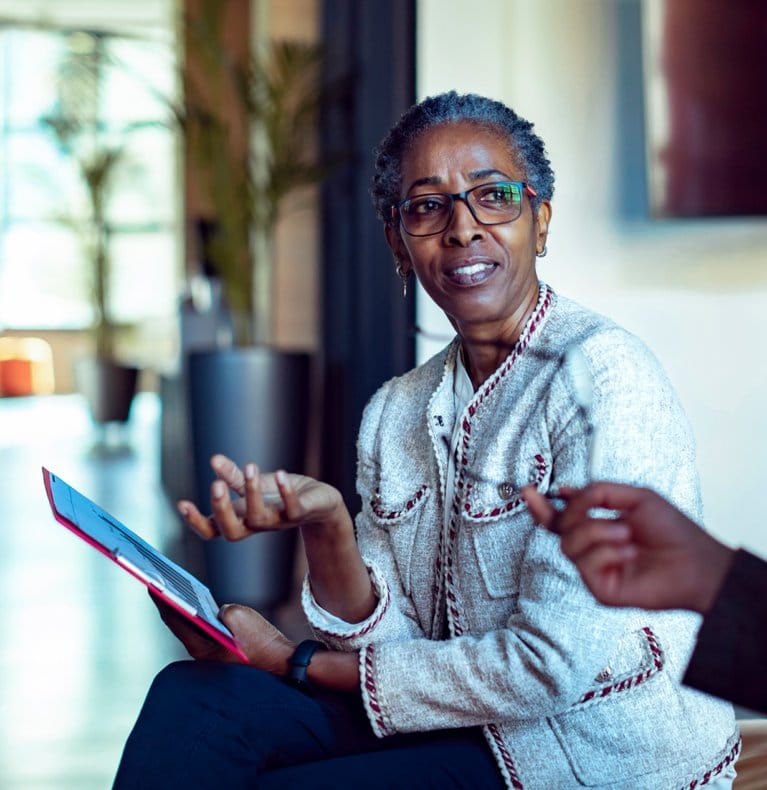 Resident engaged in conversation in a common area